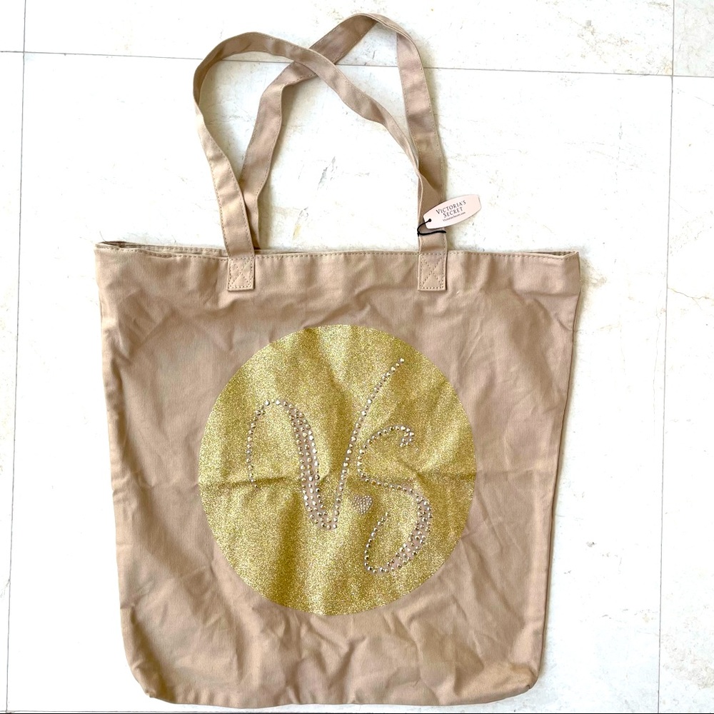 Victoria’s Secret beige and gold tote bag